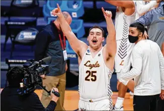  ?? AJ MAST/ ASSOCIATED PRESS ?? Loyola Chicago center Cameron Krutwig celebrates after a 71- 60 victory over Georgia Tech on Friday in a first- round game of the NCAA Tournament in Indianapol­is.