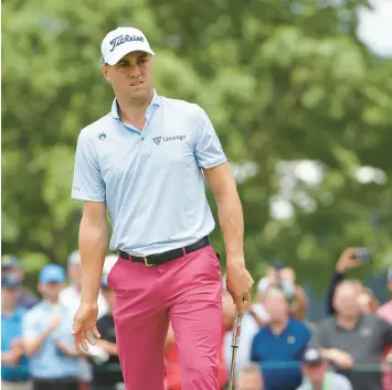  ?? PATRICK SMITH/GETTY ?? Justin Thomas of the United States looks on from the first green during the third round of the 122nd U.S. Open on Saturday.