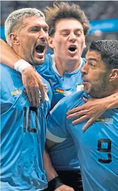  ?? ?? FINISH: Giorgian de Arrascaeta, left, celebrates – but Uruguay’s mood was to change dramatical­ly at the end.