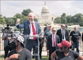  ?? Picture: AP ?? Making a point: Justice For J6 rally organiser Matt Braynard speaks near the Capitol yesterday.