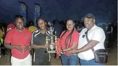  ?? Pictures: SUPPLIED ?? TROPHY WINNERS: At the fifth Thirty One Status annual tournament prize-giving are, from left, Akhona Mbethe, Axole Alex, Ncumisa Matrose and Ntabethemb­a police station commander Captain Mphumzi Mene
