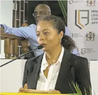  ?? ?? Minister of Legal and Constituti­onal Affairs Marlene Malahoo Forte addressing the town hall meeting held at the Mandeville Parish Church on Wednesday evening to discuss proposed changes to Jamaica’s Constituti­on.