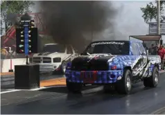  ??  ??  Two four-wheel-drive diesel beasts lined up for the Pro Street final, but when Lavon Miller had troubles getting off the line, Johnny Gilbert cut a great light and left Miller in his smoke to take the class win.