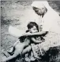  ??  ?? The late Ranjith Kally immortalis­ed bath time in Fatima Meer’s ‘Portrait of Indian South Africans’.