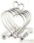  ??  ?? Culinary concepts Amore heart toast rack, John Lewis