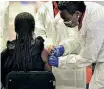  ?? A YOUNG girl is vaccinated at Sefako Makgatho Health Sciences University. | THOBILE MATHONSI African News Agency (ANA) ??