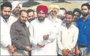  ??  ?? Technical education minister Charanjit Singh Channi (centre) at a grain market in Rupnagar on Tuesday.