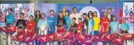  ??  ?? Soha Moitra, regional director, CRY; Rekha Shukla, VP, Delhi Capital Badminton Associatio­n (DCBA); Sameer Bansal, Head, Bancassura­nce, PNB MetLife, and chief guest Prakash Padukone (all at the back) pose with the winners of the JBC 2018