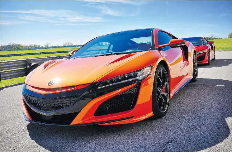  ?? PHOTOS: DEREK MCNAUGHTON/DRIVING.CA ?? The 2019 model year brings a number of changes to the NSX, starting with stunning new Thermal Orange Pearl paint.