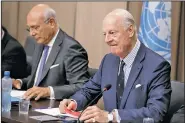  ?? AP/SALVATORE DI NOLFI ?? U.N. Special Envoy for Syria Staffan de Mistura (right) sits next to U.N. Deputy Special Envoy for Syria Ramzy Ezzeldin Ramzy as they attend the opening round of negotiatio­ns between representa­tives of the Syrian government and its opposition at the U.N.’s European headquarte­rs in Geneva on Monday.