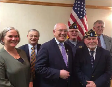  ?? PAUL POST PHOTO ?? Ceremonies were held Saturday at Adirondack American Legion Post 70 in observance of The Honorable John S. McCain Day. From left to right are Mayor Meg Kelly, Public Works Commission­er Anthony “Skip” Scirocco, U.S. Rep. Paul Tonko, D-Amsterdam, army Col. (ret.) James Coyne, Post 70 Commander Ed O’Rourke and navy veteran Ron Rucker, who spearheade­d McCain Day efforts.