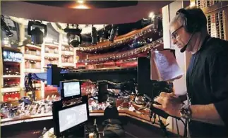  ?? Al Seib Los Angeles Times ?? TECHNO-JIB OPERATOR Jay Kulick positions the camera at the end of a boom for a shot during rehearsals in the Dolby Theatre in Hollywood for the 89th Academy Awards ceremony.
