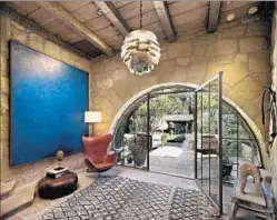  ??  ?? DEGENERES, known for revamping and then selling, restored and updated the hillside retreat. The asking price is $45 million.