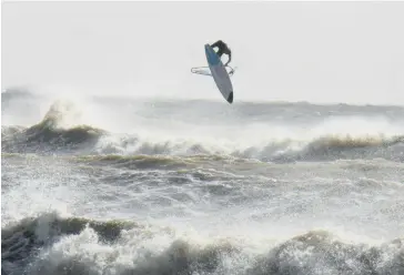  ?? ?? Barry Clough took this picture of a windsurfer off Worthing beach on Monday, when winds were still strong