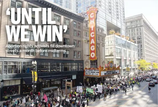  ?? PAT NABONG/SUN-TIMES PHOTOS ?? Amy Rosen (left) was among the hundreds of abortion rights advocates who marched downtown Saturday.