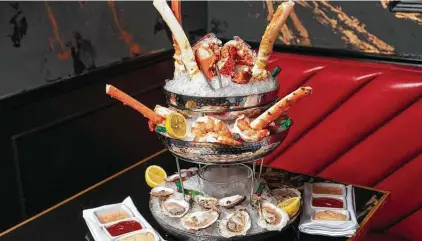  ?? Gatsby’s Prime Steakhouse ?? Raw bar options include a seafood tower at Gatsby's Prime Steakhouse.