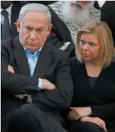  ??  ?? Benjamin Netanyahu and his wife, Sara, at his father’s funeral, Jerusalem, April 2012