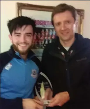  ??  ?? Adam Wixted receives his Drogheda Independen­t Man of the Match award for the recent Drogheda United v Galway United game from Marcus Cavaroli.