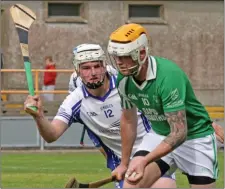  ??  ?? Shane O’Rourke of Crossabeg-Ballymurn on the ball as Eoin Doyle (Craanford) prepares to challenge in Innovate Wexford Park on Sunday.