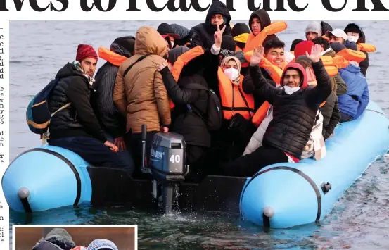  ?? ?? V for victory: One of the small migrant boats intercepte­d off Dover yesterday