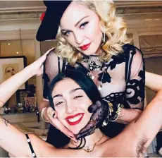  ??  ?? That’s my girl: Madonna with unshaven Lourdes