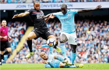  ??  ?? Manchester City’s Benjamin Mendy (right) and David Silva in action with Crystal Palace’s Andros Townsend during the English Premier League match at Etihad Stadium in Manchester, Britain in this Sept 23, 2017 file photo. — Reuters photo