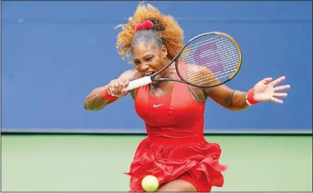  ??  ?? Serena Williams, of the United States, returns a shot to Tsvetana Pironkova, of Bulgaria, during the quarter-finals of the US Open tennis championsh­ips
on Sept 9 in New York. (AP)