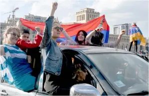  ??  ?? People celebrate Armenian prime minister Serzh Sarkisian’s resignatio­n. — AFP photo