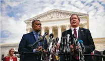  ?? New York Times file photo ?? Texas Attorney General Ken Paxton, shown outside the Supreme Court with Karl Racine, attorney general of the District of Columbia, is leading a multistate probe of Google.