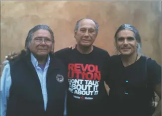  ?? COURTESY PHOTO ?? Romero, far right, in Santa Fe in 2012 with AIM founders, Dennis Banks, left, and Russel Means.