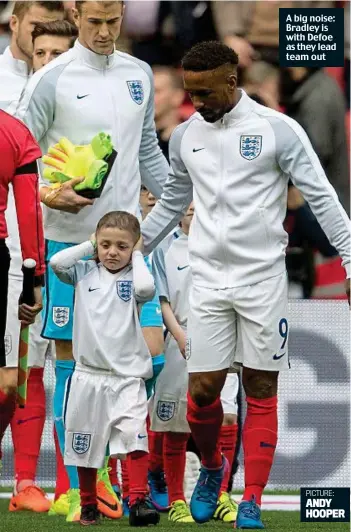  ??  ?? A big noise: Bradley is with Defoe as they lead team out PICTURE: ANDY HOOPER