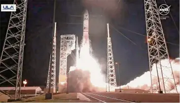  ?? ?? In this NASA image, United Launch Alliance's Vulcan rocket with Astrobotic Technology's lander onboard is launched from Cape Canaveral Monday. The first U.S. lunar lander in more than 50 years rocketed toward the moon Monday, launching private companies on a space race to make deliveries for NASA and other customers.