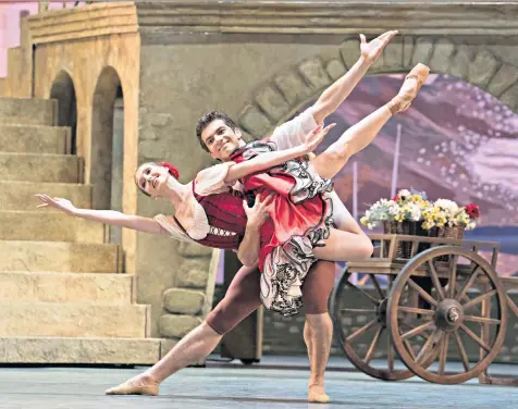  ??  ?? Lacking passion: the Bolshoi's Margarita Shrainer and Igor Tsvirko as Kitri and Basil in Don Quixote