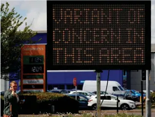  ??  ?? Sign of the times…a warning in Bolton highlighti­ng growing fears of the Indian variant