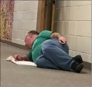  ?? SUBMITTED PHOTO ?? Wounded ‘victim” (reporter Gil Cohen) lying on floor of Conshohock­en Elementary School during the active shooter drill.