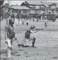  ??  ?? File photo of a policeman aiming a pellet gun at protesters in Srinagar GETTY IMAGES