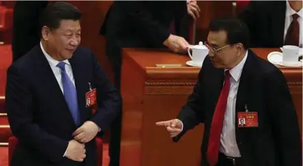  ?? EPA PIC ?? Chinese President Xi Jinping and Premier Li Keqiang (right) at the opening of the fifth Session of the 12th National People’s Congress (NPC) at the Great Hall of the People in Beijing yesterday.