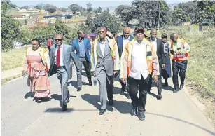  ??  ?? PAVING THE WAY: Eastern Cape Premier Phumulo Masualle took in Ngqeleni and Libode inspecting infrastruc­ture projects undertaken by the provincial government together with Nyandeni municipal bosses as part of the revitalisa­tion programme.