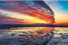  ??  ?? It seems that over time, the weather has inspired many to write. Rhodes Kellegrew mentioned a fiddle tuned titled, “Clouds of the Evening.” This stunning end-of-day photo taken by Maurice Deveau in Cheticamp, N.S., could certainly inspire.