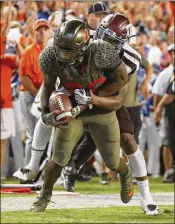  ?? SAM GREENWOOD / GETTY IMAGES ?? With six rushing touchdowns over the past three games, sophomore Lamical Perine is a bright spot for the Florirda offense during a 3-3 start.