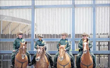  ?? Sandy Huffaker Getty Images ?? CALIFORNIA’S EFFORTS to protect immigrant families are coming into conf lict with the actions of the Border Patrol.