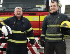  ?? Station Officer Paudie Mangan with his son, Denis, at Killarney Fire Station. Photo by Michelle Cooper Galvin ??