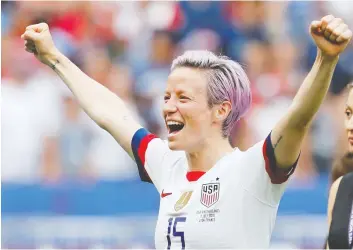  ?? BERNADETT SZABO / REUTERS ?? Women’s World Cup champion Megan Rapinoe of the U.S. says her team’s legal fight for gender pay
equity is “on behalf of women everywhere to be treated respectful­ly and paid lawfully.”