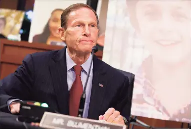  ?? Shawn Thew / Associated Press ?? Sen. Richard Blumenthal, D-Conn, speaks before the Senate Judiciary Committee Monday in Washington, backed by a photo of Conner Curran, of Ridgefield.