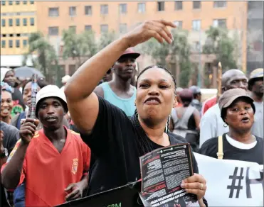  ?? PHOTO: TIMOTHY BERNARD/AFRICANNEW­SAGENCY/(ANA) ?? Black First Land First supporters arrive at the Library Gardens to deliver a memorandum of demands at Luthuli House nearby, while the ruling ANC top brass seemed determined to see the back of President Jacob Zuma yesterday.