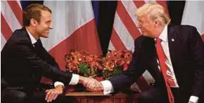  ?? REUTERS PIC ?? United States President Donald Trump shaking hands with French President Emmanuel Macron in New York last year.