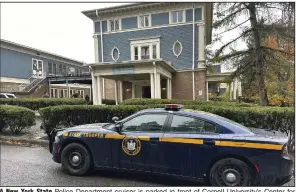  ?? (AP/David Bauder) ?? A New York State Police Department cruiser is parked in front of Cornell University’s Center for Jewish Living on Monday in Ithaca, NY.