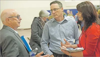  ?? MITCH MACDONALD/TC MEDIA ?? Kinkora parent Janet Payne, from right, and Borden-Kinkora MLA Jamie Fox confront Public Schools Branch member, Harvey MacEwen, following Monday night’s meeting at Bluefield High School in Hampshire. Although Payne was relieved that a recommenda­tion to...