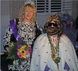  ?? Joseph B. Nadeau photo ?? The unveiling of King Jace XXVI is begun by Mardi Gras Queen Lori Paul Thuot. This year’s King Jace is none other than Dominique Doiron.