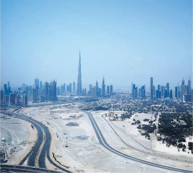  ?? MARWAN NAAMANI / AFP / GETTY IMAGES FILES ?? The Burj Khalifa, the world’s tallest tower, had to be built with sand from Australia because of a shortage of the material in Dubai.